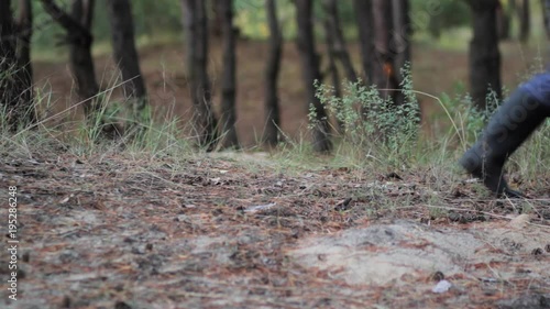 Wallpaper Mural feet of man in forest, wellies Torontodigital.ca