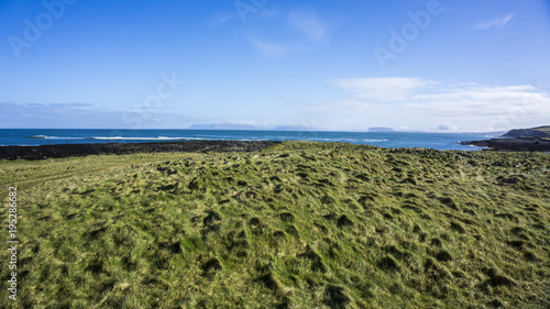 Green Kerry fields on irish coast