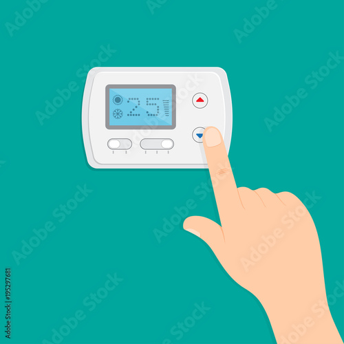 Hand is pushing button to climate control panel