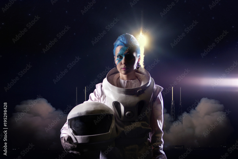 Fototapeta premium Astronaut on background of the rocket launch. Elements of this image furnished by NASA.