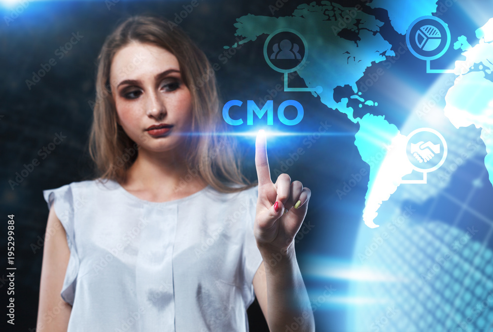 The concept of business, technology, the Internet and the network. A young entrepreneur working on a virtual screen of the future and sees the inscription: CMO The concept of business, technology, the Internet and the network. A young entrepreneur working on a virtual screen of the future and sees the inscription: CMO