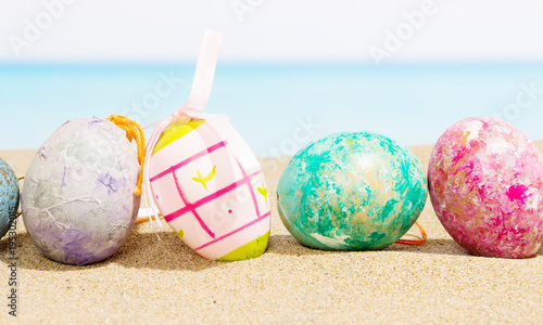 Easter on beach background. Eggs on the