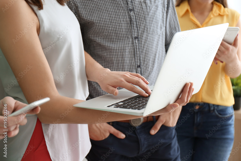 Naklejka premium Team of young marketing managers indoors