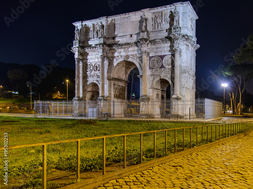 Monuments of ancient Rome at night. Colosseum, Arch of Constantine and Roman Forum