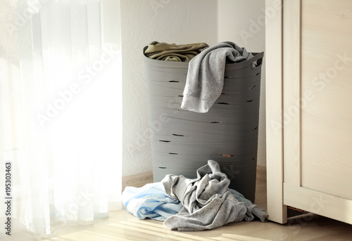 Laundry basket with dirty c...