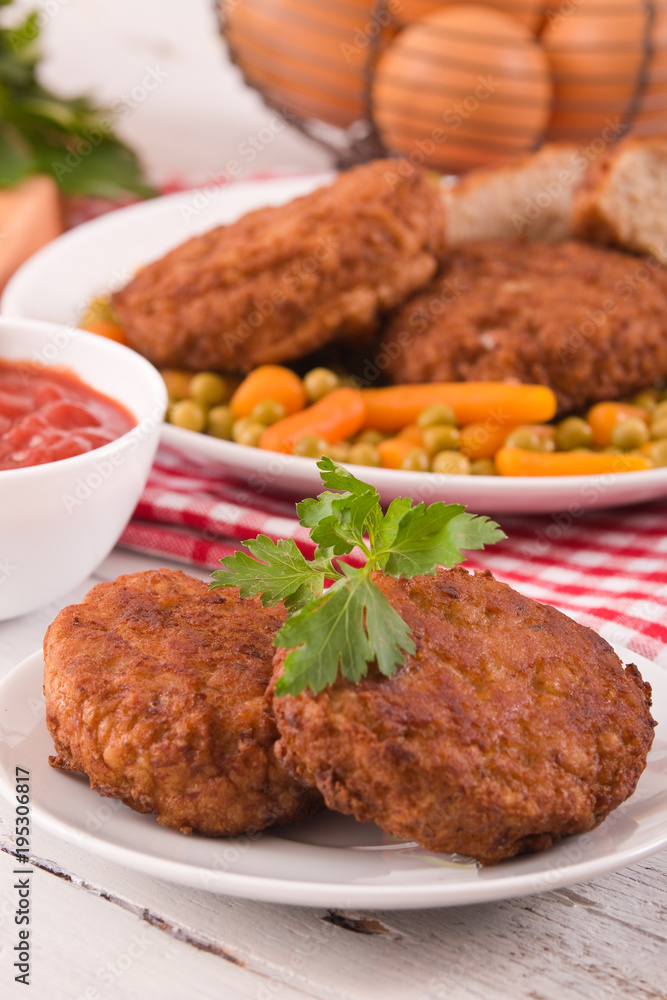 Meatballs on white dish. 