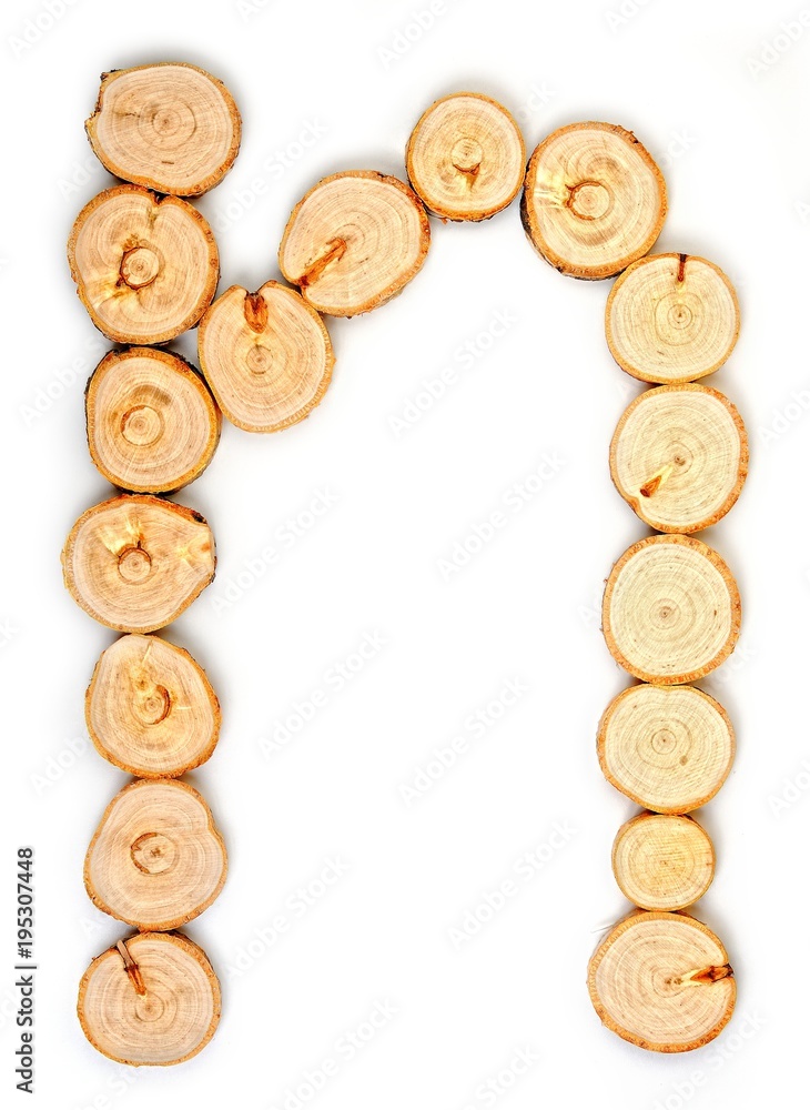 Alphabet letters made from Wood slice on white Background.n Alphabet letters made from Wood slice on white Background.n