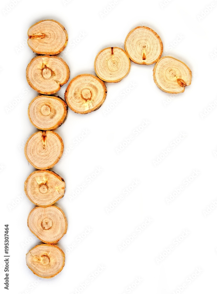 Alphabet letters made from Wood slice on white Background.r Alphabet letters made from Wood slice on white Background.r