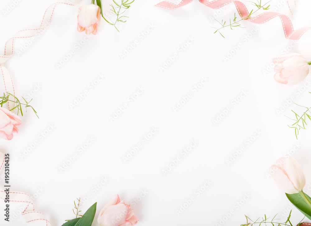 Flowers composition. Frame made of pink flowers on white background. Valentine's Day. Flat lay, top view.