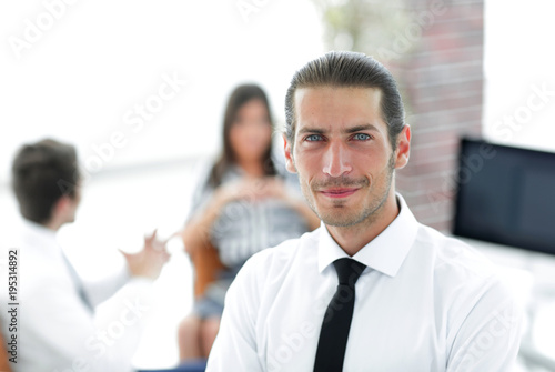 successful young business men on blurred background