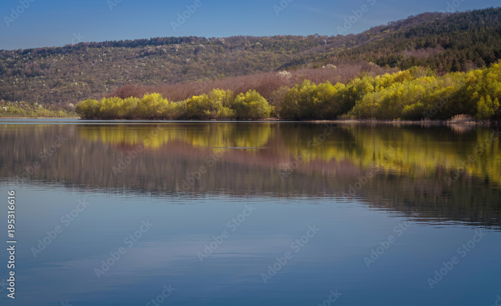 river landscape. Photo from the boat. A lot of sky. Blue sky with clouds. Greenish waves. Summer. the Dniester River