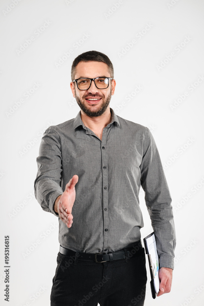 Fototapeta premium Cheerful businessman give you a hand.