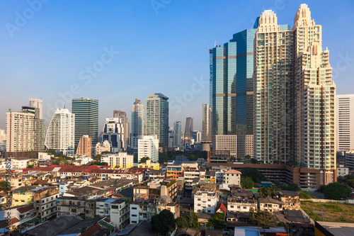 Contrast between new and holding buildings in Bangkok, Thailand skyline