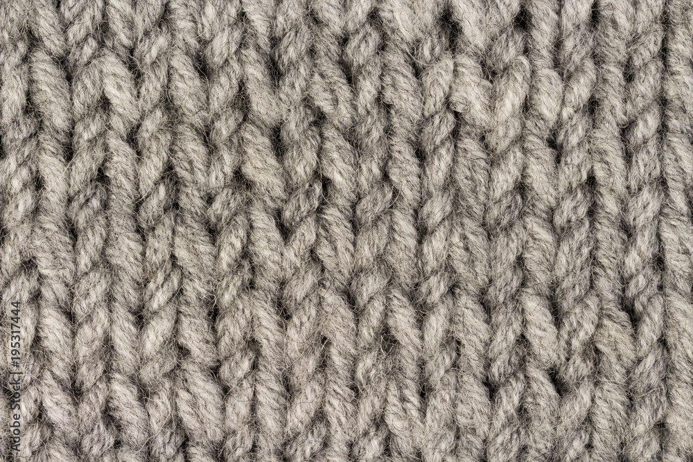 Gray knitting wool texture background. Macro Gray knitting wool texture background. Macro