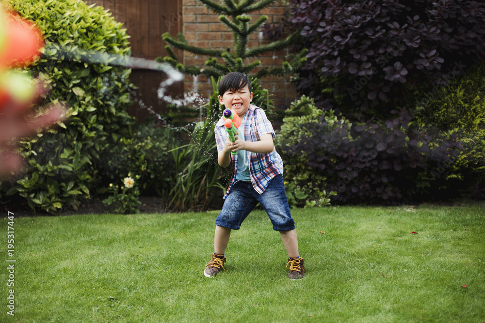 Having a Water Fight in the Garden Having a Water Fight in the Garden