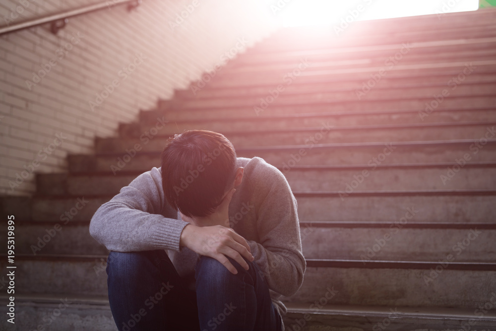 © ryanking999 - depressed man sit in underground