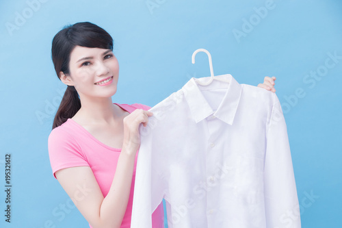 housewife take clean shirt