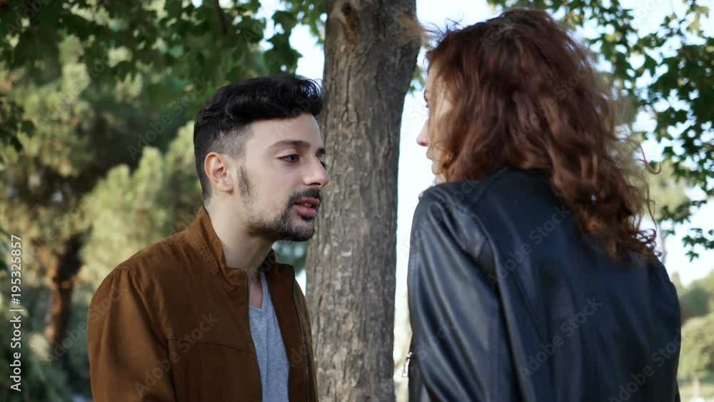 violent bickering between lovers, she gives him a slap- slow motion violent bickering between lovers, she gives him a slap- slow motion