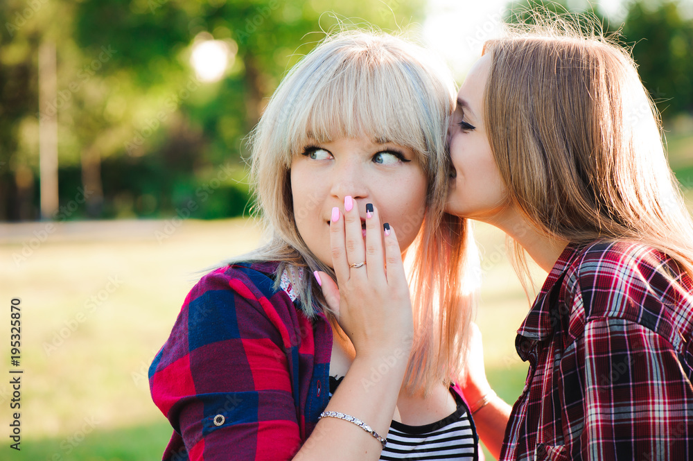 Two pretty cuter teenagers shares secrets, gossip. Surprise face, emotions. Two pretty cuter teenagers shares secrets, gossip. Surprise face, emotions.
