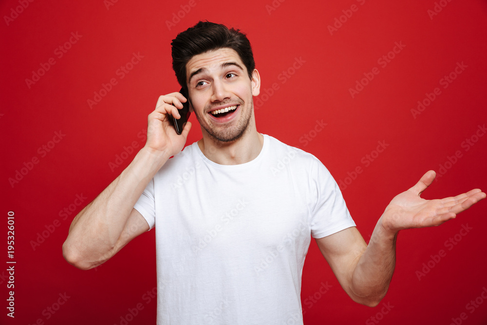 Portrait of a handsome young man in white t-shirt Portrait of a handsome young man in white t-shirt