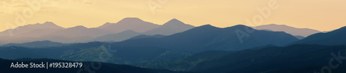 Abstract panoramic mountain landscape, tonal perspective at sunset.
