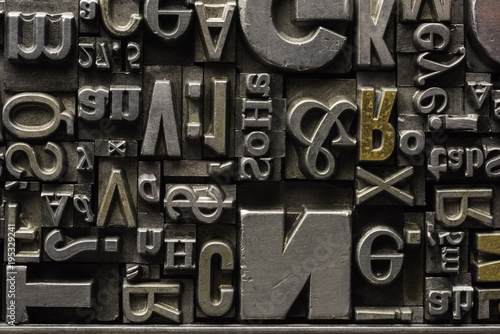 Metal Letterpress Types.
A background from many historical typography letters in black and white with white background.
