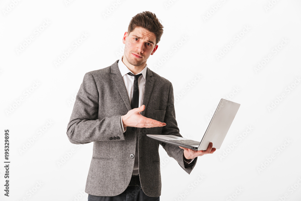 Portrait of a confused young businessman Portrait of a confused young businessman