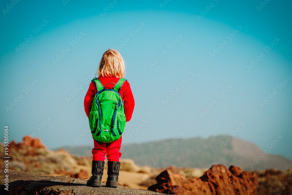 little girl hiking in mountains, family travel little girl hiking in mountains, family travel