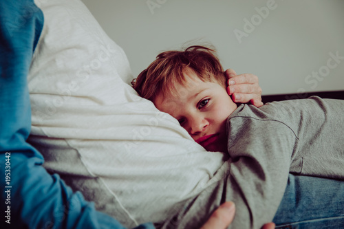 sad child hugging dad at home, sorrow, pain, depression