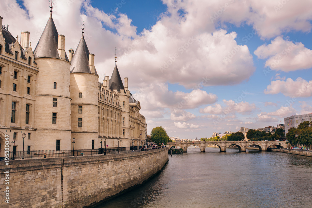 a daytime view of the castle Conciergerie - former Royal Palace and prison. located in the West of the island of the city and today it is part of a large complex known as the Palace of justice. Paris a daytime view of the castle Conciergerie - former Royal Palace and prison. located in the West of the island of the city and today it is part of a large complex known as the Palace of justice. Paris