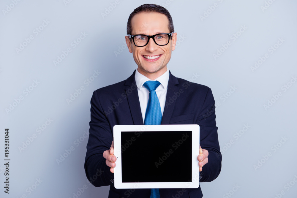 Consultant boss collar read promo tux office look attention toothy smile people person banker concept. Portrait of smart intelligent friendly employer with gadget isolated gray background copyspace Consultant boss collar read promo tux office look attention toothy smile people person banker concept. Portrait of smart intelligent friendly employer with gadget isolated gray background copyspace