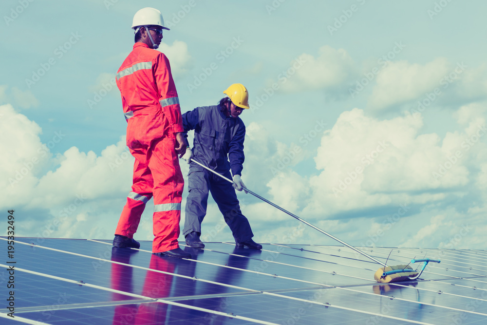operation and maintenance in solar power plant ; engineering team working on checking and maintenance in solar power plant ,solar power plant to innovation of green energy for life. operation and maintenance in solar power plant ; engineering team working on checking and maintenance in solar power plant ,solar power plant to innovation of green energy for life.