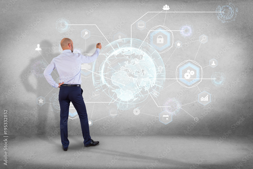 Businessman in front of a wall with an International business network connection displayed on a futuristic interface with technology icon and sphere globe - Worldwide business concept Businessman in front of a wall with an International business network connection displayed on a futuristic interface with technology icon and sphere globe - Worldwide business concept