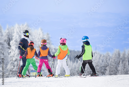 Ski school on mountain peak