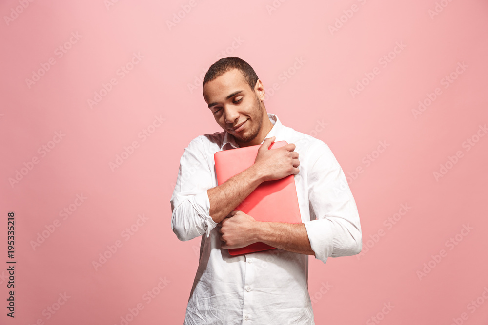 Businessman hugging laptop Businessman hugging laptop