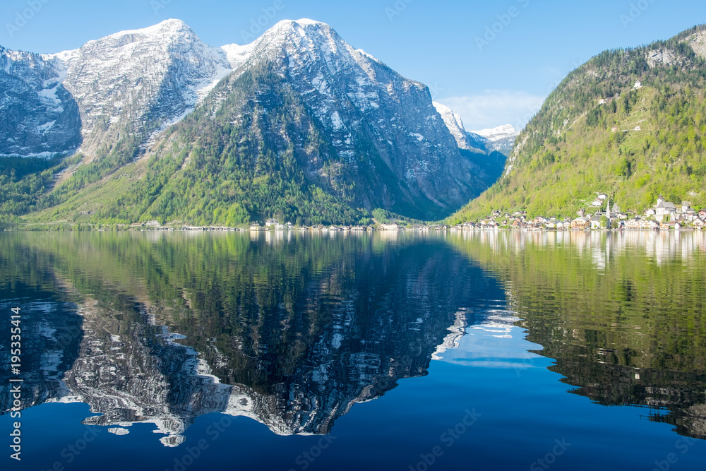 rocky shore have reflection on lake