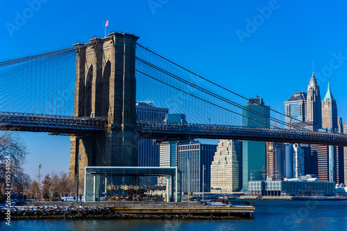Lower Manhattan Downtown skyline panorama from Brooklyn Bridge Park riverbank, New York City, USA