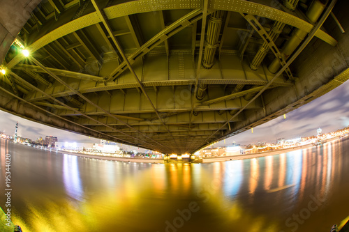 Night scenic view of river under the bridge