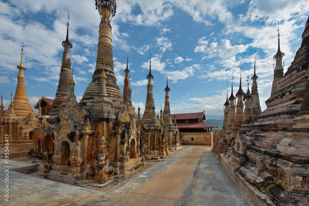 Shan. Myanmar. 11/29/2016. A favorite place for tourist excursions - Takhaung Mwetaw pagoda, where more than 200 stupas, with a unique bas-reliefs. Ragada located on the shores of Inle lake. Shan. Myanmar. 11/29/2016. A favorite place for tourist excursions - Takhaung Mwetaw pagoda, where more than 200 stupas, with a unique bas-reliefs. Ragada located on the shores of Inle lake.