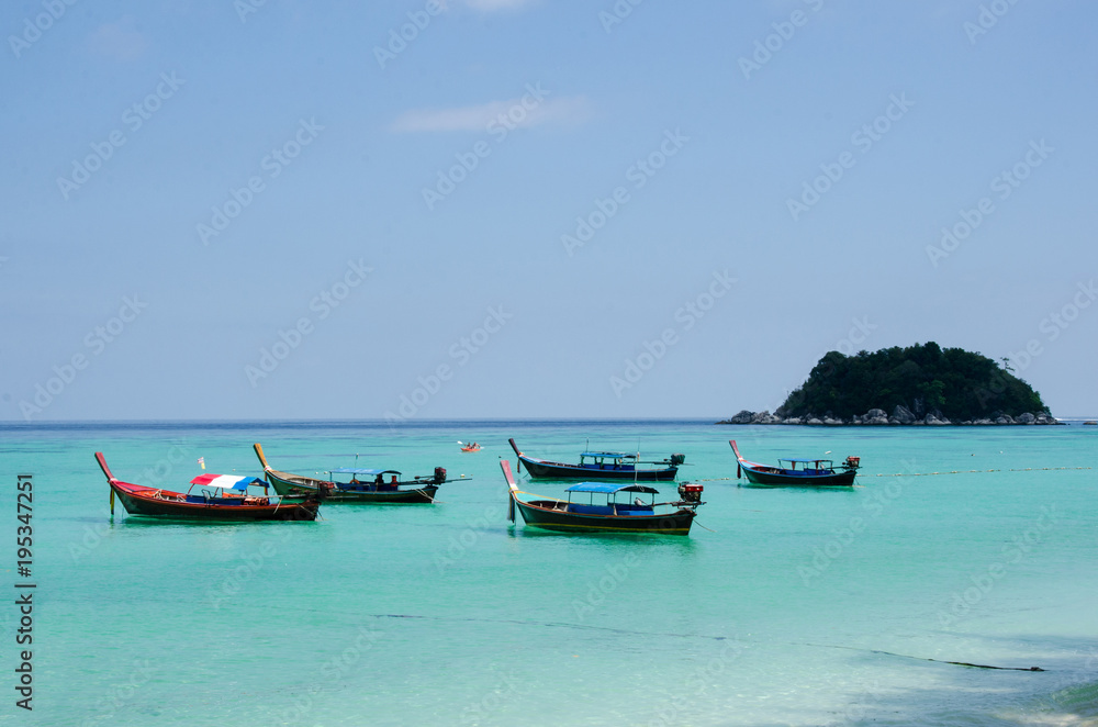 Long tail boat on tropical beach, Lipe, Thailand