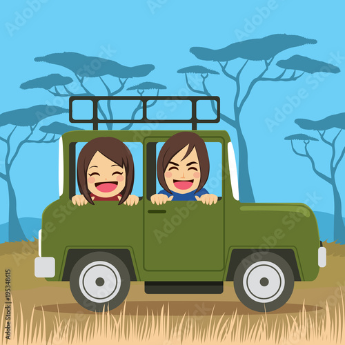 Cute young couple on safari tour vacation riding car happy
