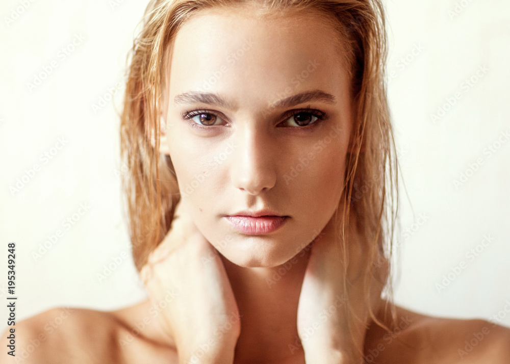 Happy beautiful girl. Nude fashion portrait of a white-haired girl. Expressive facial expressions .Cosmetology and Spa Happy beautiful girl. Nude fashion portrait of a white-haired girl. Expressive facial expressions .Cosmetology and Spa