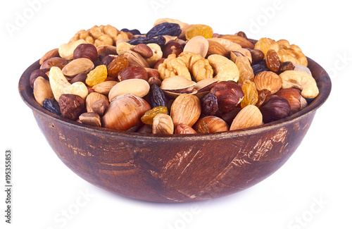 mix nuts on wood plate on white background