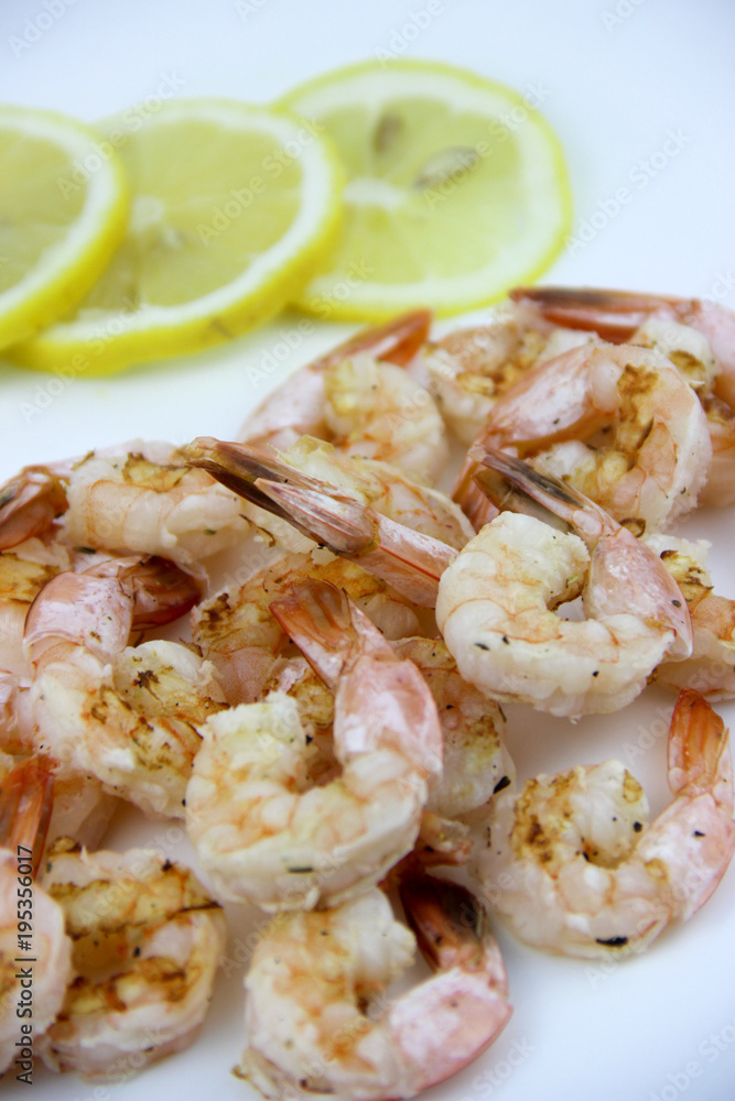 seafood. shrimp on a plate with lemon. seafood. shrimp on a plate with lemon.