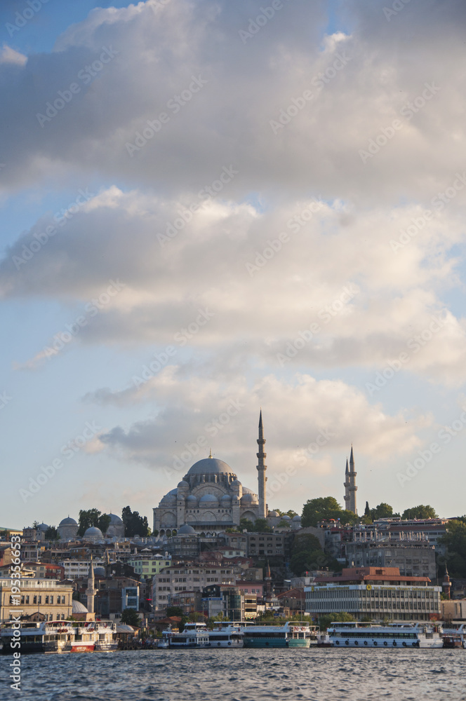 Cumulus clouds over Suleymaniye mosque in Eminonu, istanbul, Turkey
