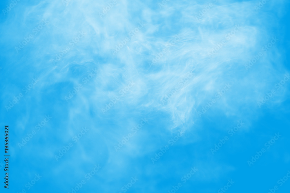 White smoke on blue background.