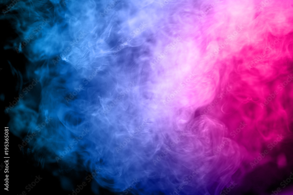 Fototapeta premium Abstract multicolored smoke on black background. Abstract bright colorful smoke on background. Color clouds.