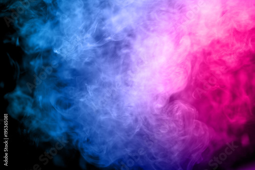 Abstract multicolored smoke on black background. Abstract bright colorful smoke on background. Color clouds.