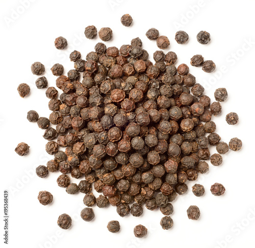 close up of dried black peppercorns isolated on white, top view