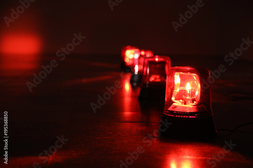 Background with red flashing alarm lights. photo